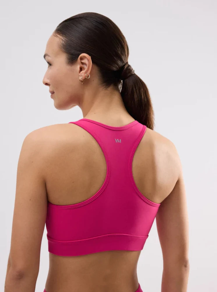 Top deportivo con relleno extraíble sujeción media fucsia Ysabel Mora