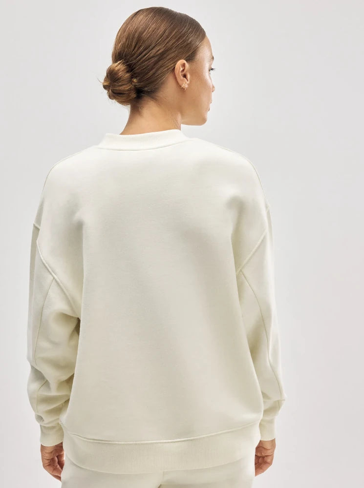 Sudadera cuello redondo con interior afelpado marfil
